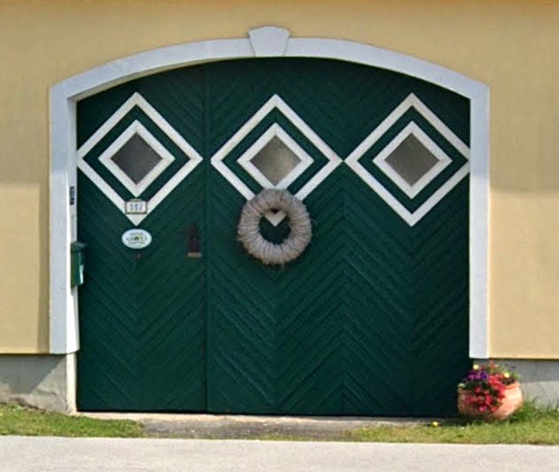 Detail - besondere Haustore: OW 37 / Steinamangererstraße 117 (S. Wilfling vorm. Topler)