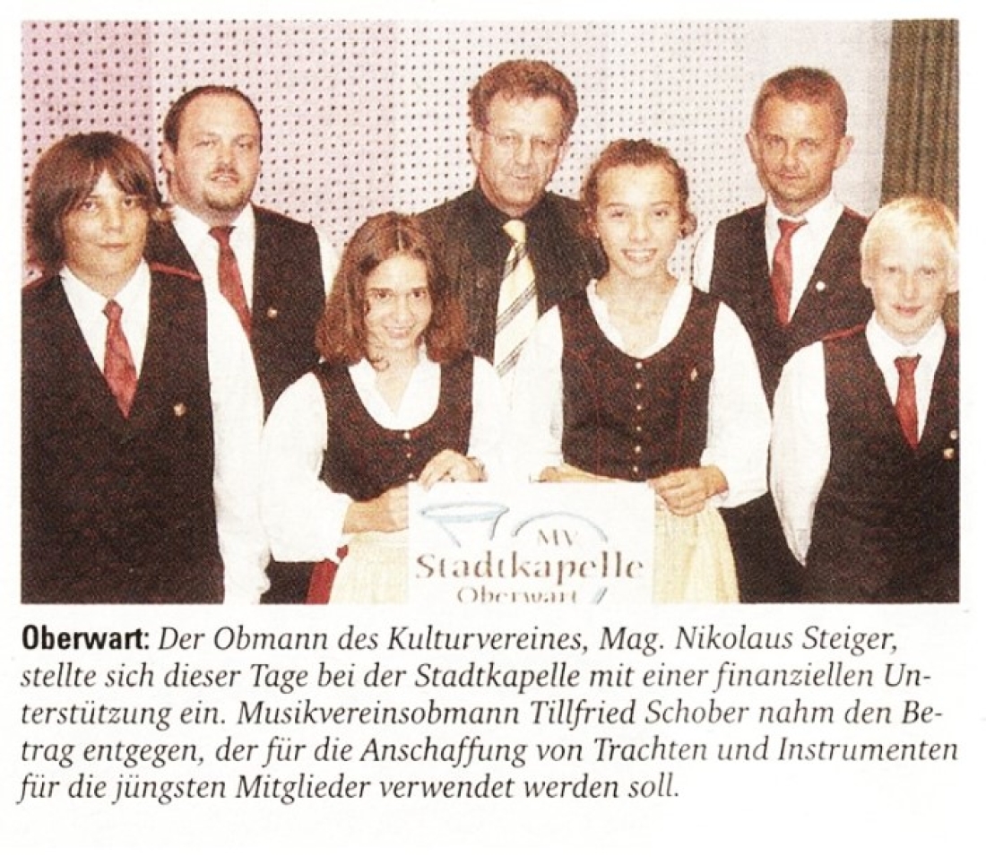 Kurzbericht in der BF vom 4. Okt. 2006: Stadtkapelle - der Obmann des Kultutvereins, Mag. Nikolaus Steiger, übergibt eine Unterstützung (Miertl/Obojkovits/Baumgartner/Poiger/Steiger/Schober)