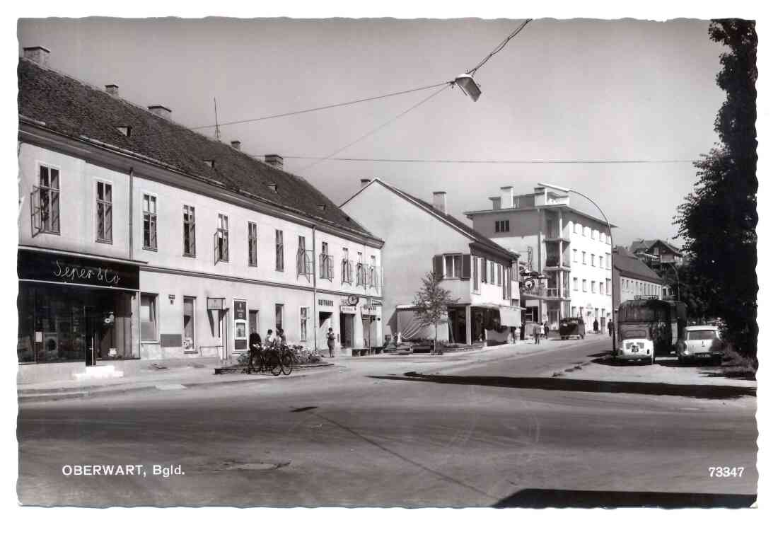 Ansichtskarte: Bahnhofstraße (im Hintergund das erste OSG-Hochhaus, Bahnhofstraße 7)